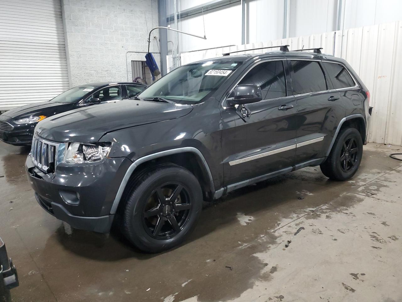2011 Jeep Grand Cherokee - Image 1
