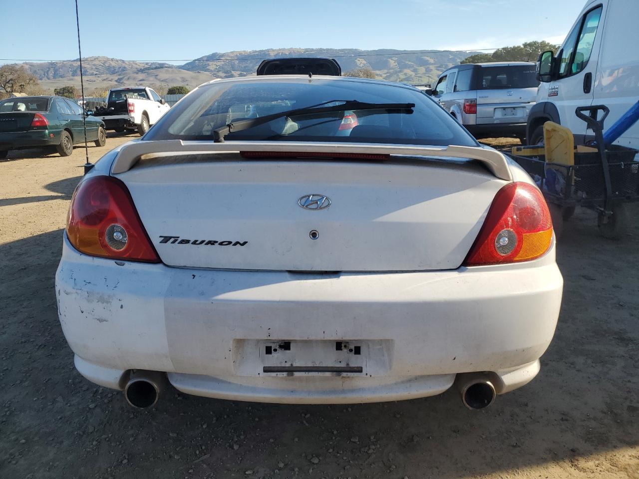 2004 Hyundai Tiburon VIN: KMHHM65DX4U153243 Lot: 87869805