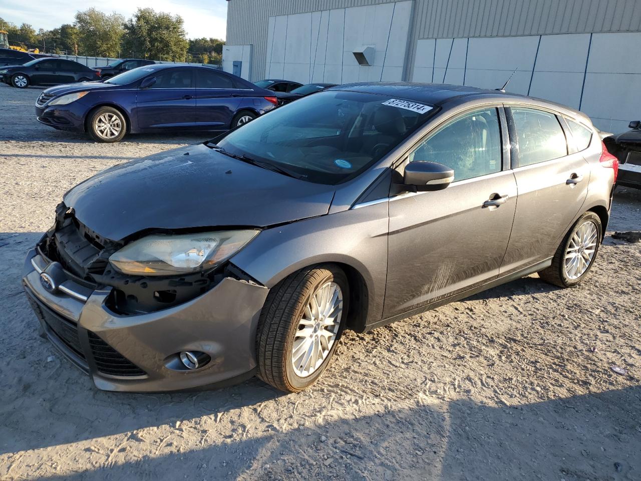 VIN 1FADP3N22DL359840 2013 FORD FOCUS no.1