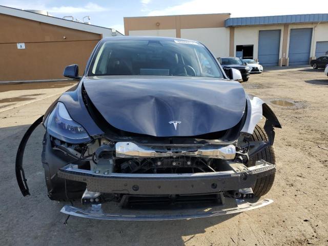  TESLA MODEL Y 2023 Серебристый