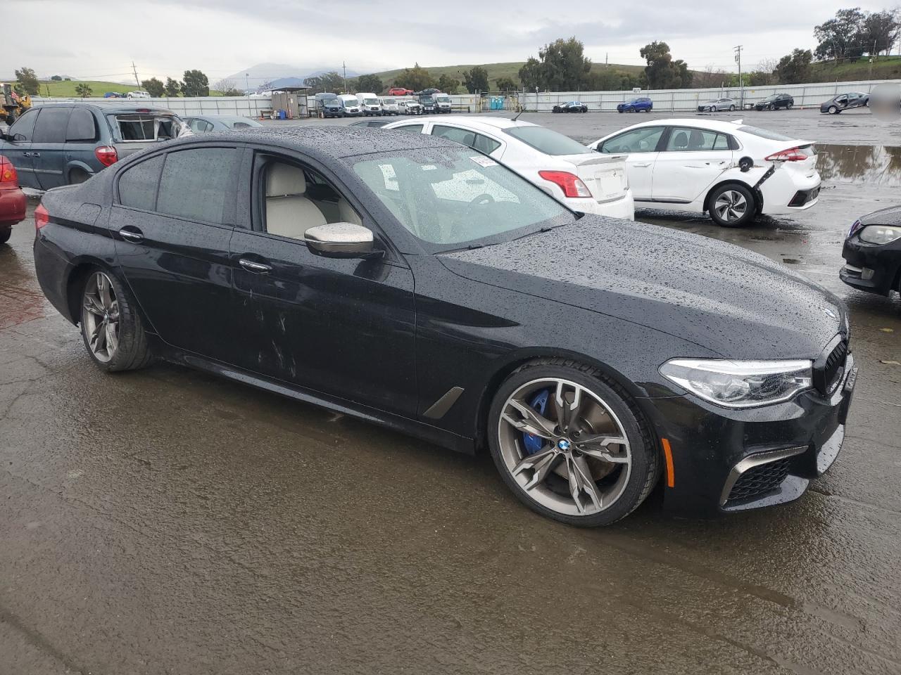 VIN WBAJB9C56JB049250 2018 BMW M5 no.4