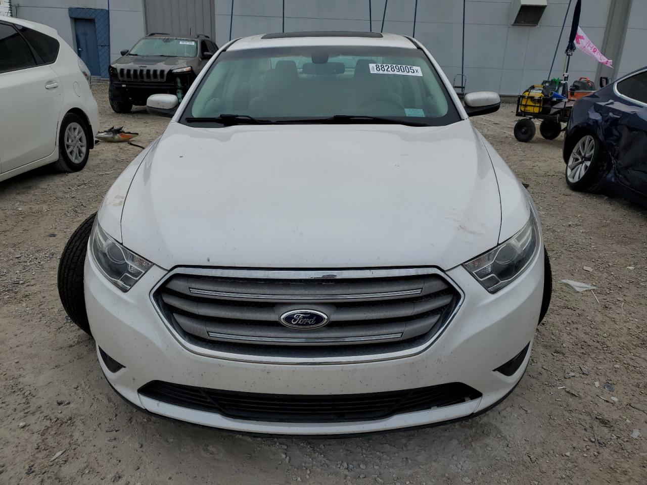 VIN 1FAHP2E8XFG161034 2015 FORD TAURUS no.5