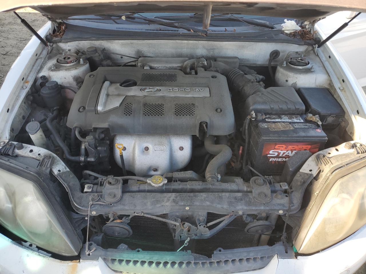 2004 Hyundai Tiburon VIN: KMHHM65DX4U153243 Lot: 87869805