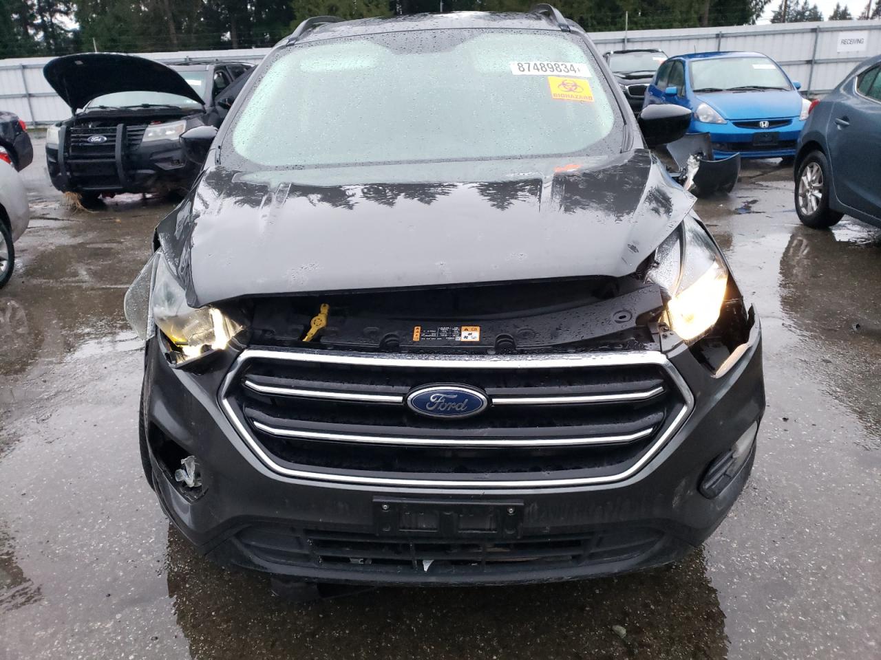 VIN 1FMCU9GD7JUA01098 2018 FORD ESCAPE no.5