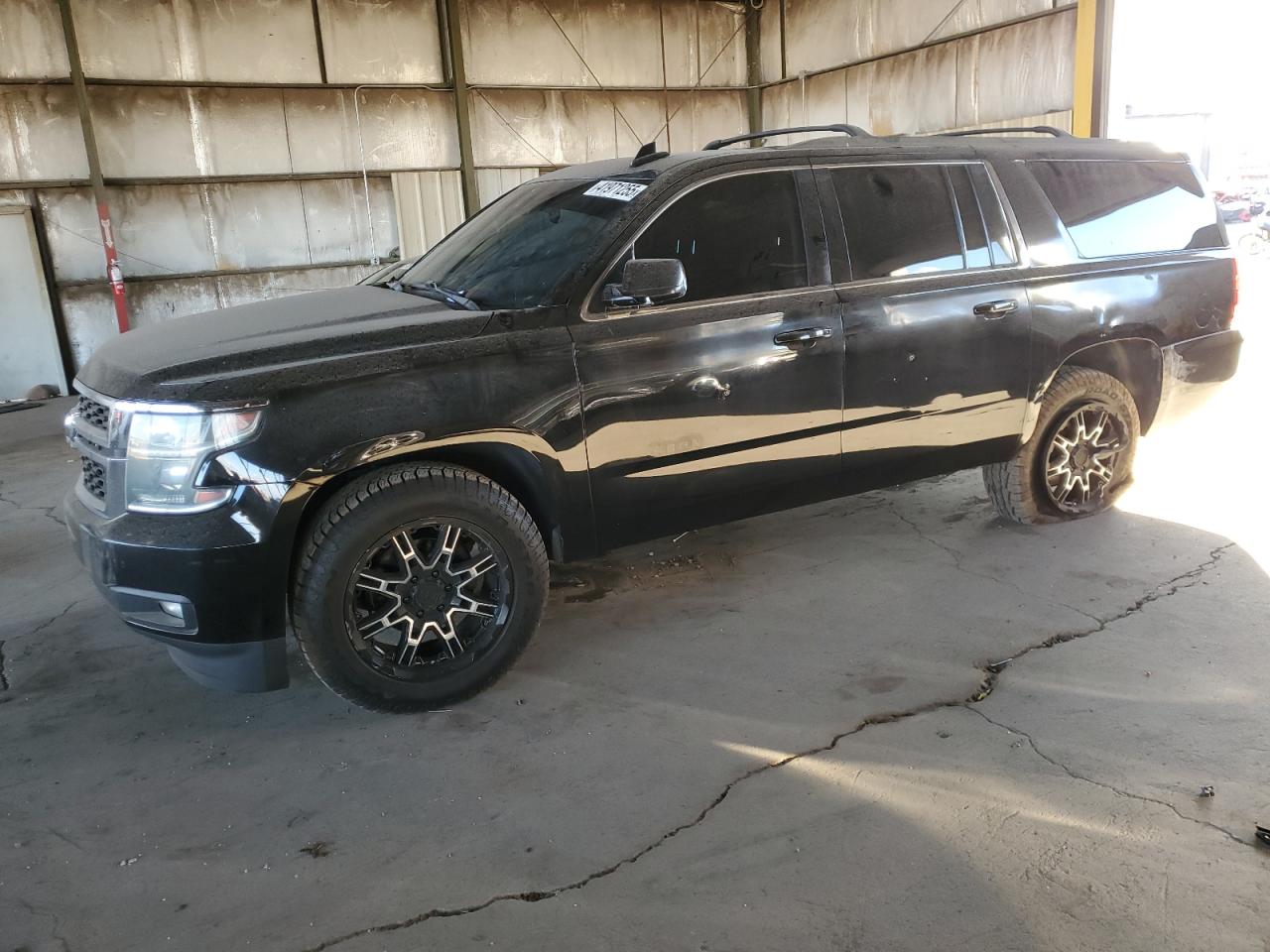 2015 Chevrolet Suburban - Image 1