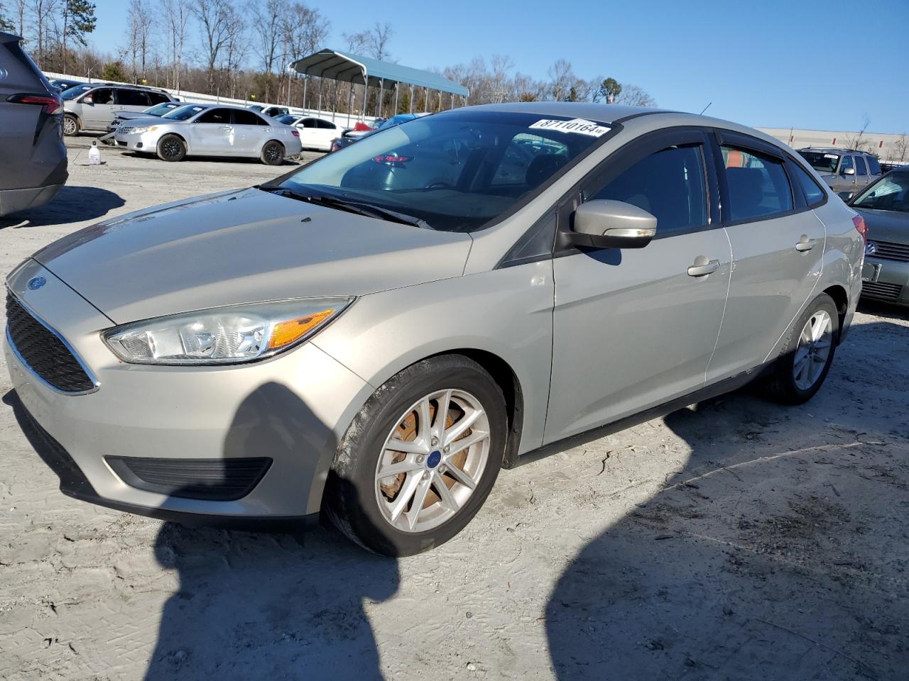 VIN 1FADP3F27FL214391 2015 FORD FOCUS no.1