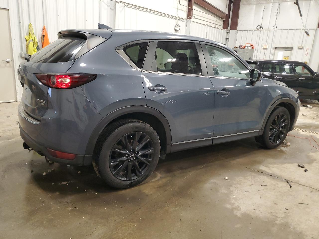 2021 Mazda Cx-5 Carbon Edition VIN: JM3KFBCY7M0370329 Lot: 43062325