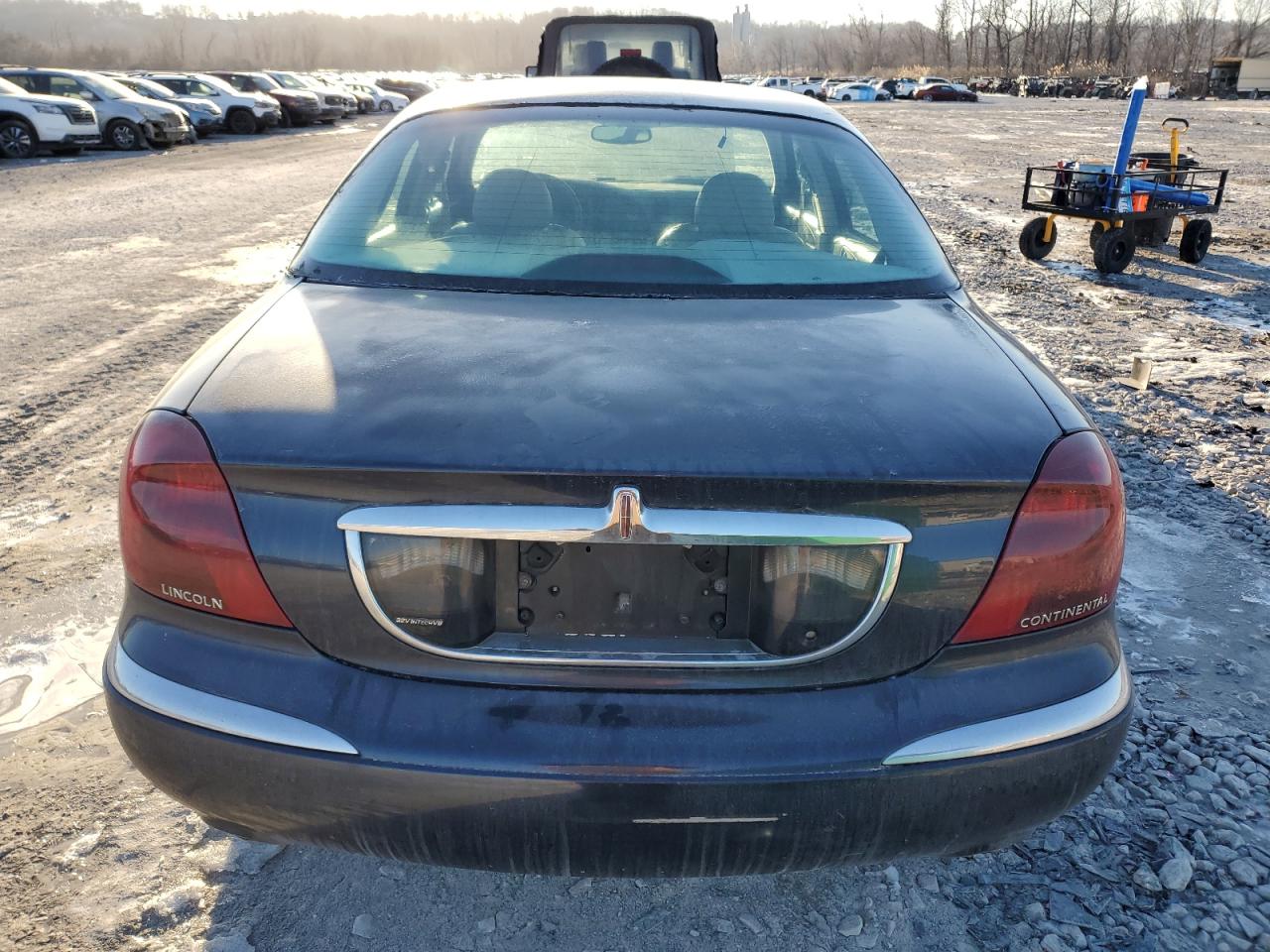 1999 Lincoln Continental VIN: 1LNHM97V2XY719495 Lot: 42239665