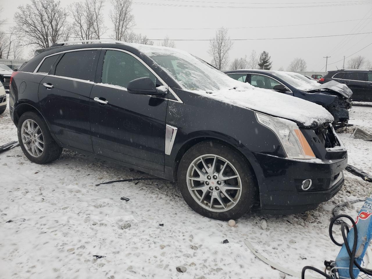 VIN 3GYFNJE3XDS618567 2013 CADILLAC SRX no.4