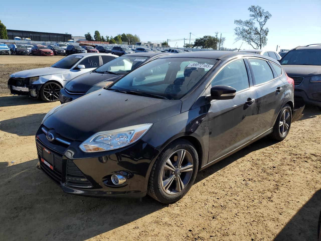 VIN 1FADP3K22EL221401 2014 FORD FOCUS no.1