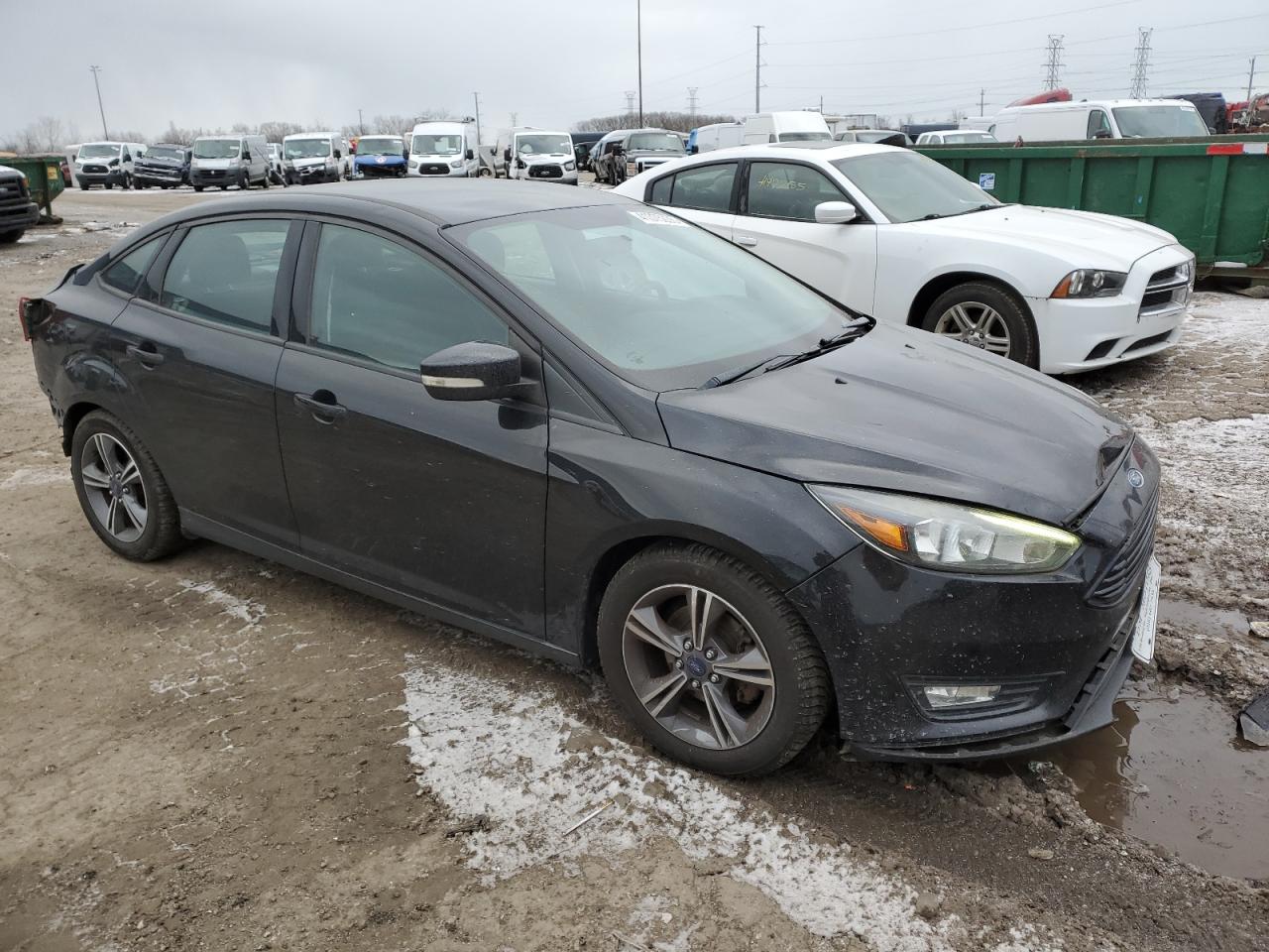 VIN 1FADP3FE8GL302247 2016 FORD FOCUS no.4