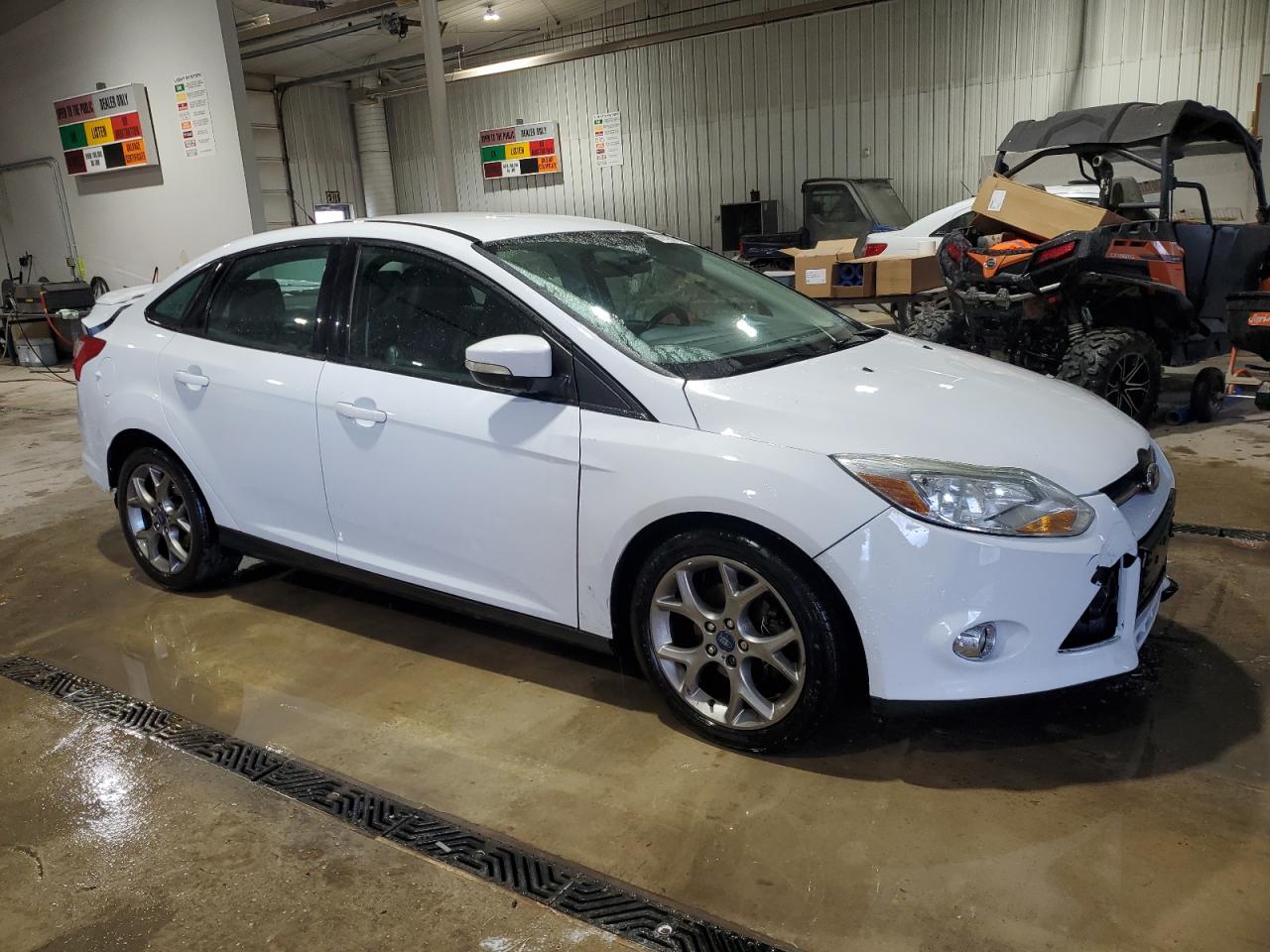 VIN 1FADP3F22EL323419 2014 FORD FOCUS no.4