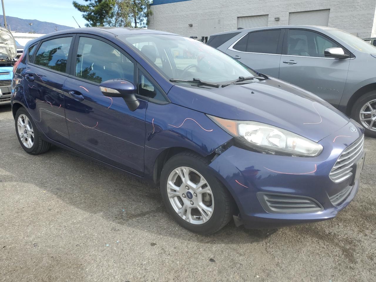 VIN 3FADP4EJ4GM154715 2016 FORD FIESTA no.4