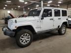 2011 Jeep Wrangler Unlimited Sahara продається в Blaine, MN - All Over