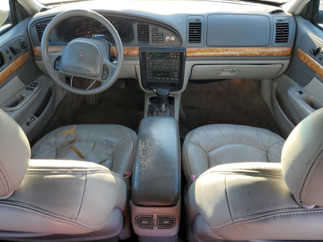 1999 Lincoln Continental VIN: 1LNHM97V2XY719495 Lot: 42239665