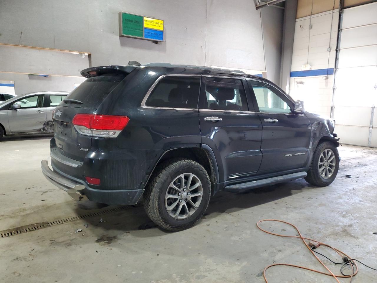 2014 Jeep Grand Cherokee - Image 3