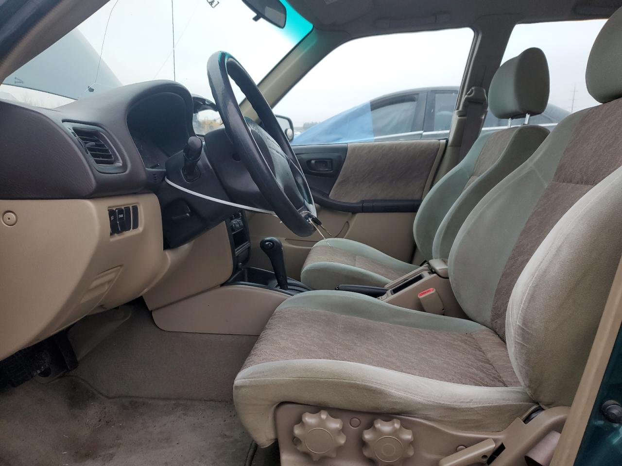 1999 Subaru Forester L VIN: JF1SF6359XH746093 Lot: 88129745