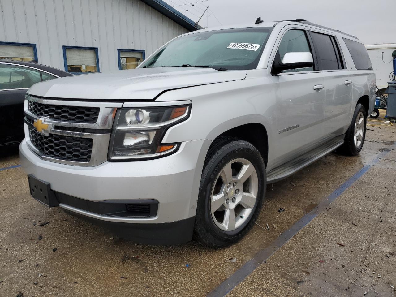 2015 Chevrolet Suburban - Image 1