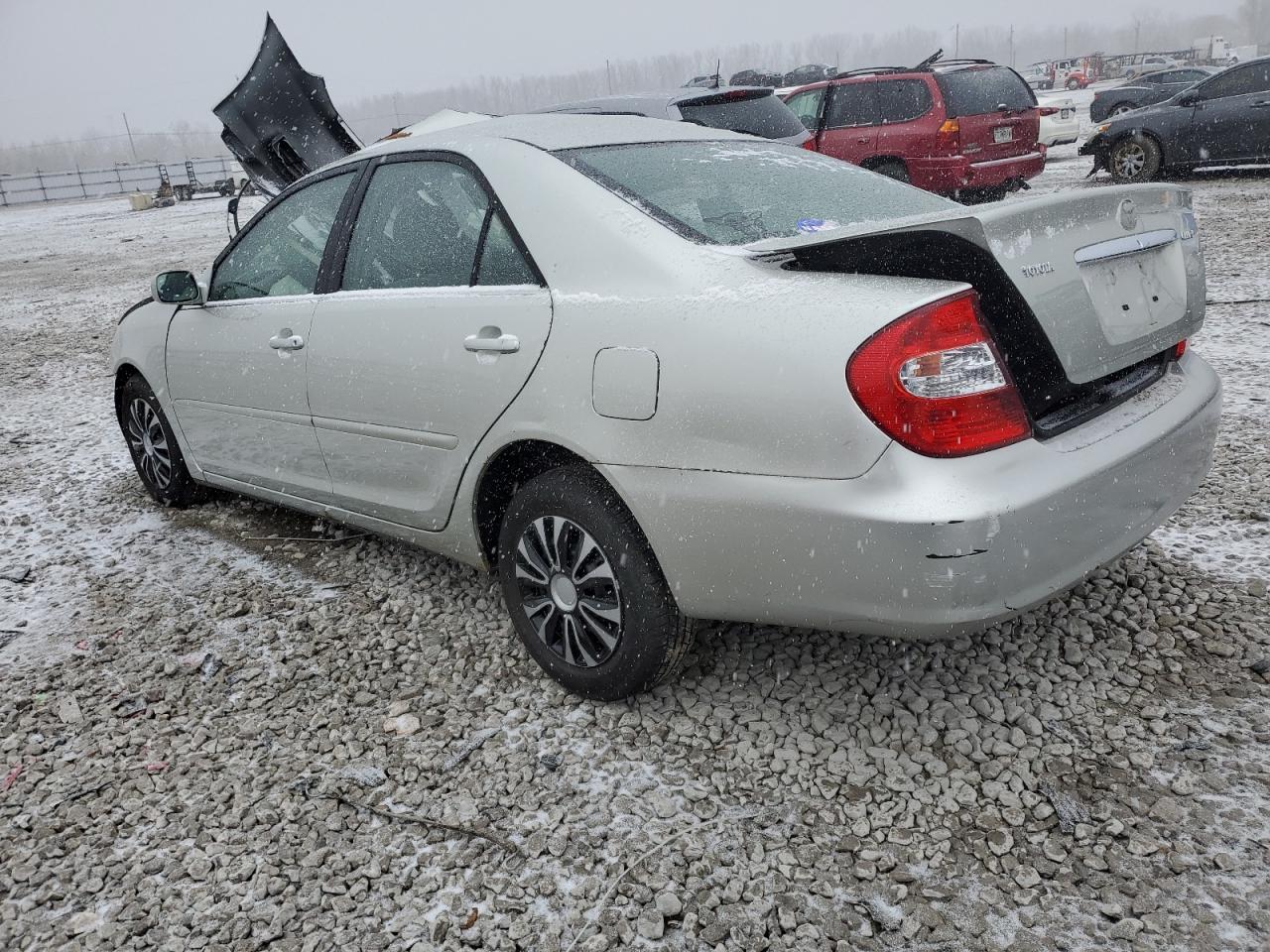 2002 Toyota Camry Le VIN: JTDBE32K720099946 Lot: 42685504