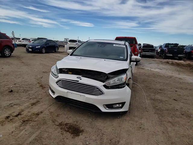 2017 Ford Focus Titanium VIN: 1FADP3J22HL235403 Lot: 42340324