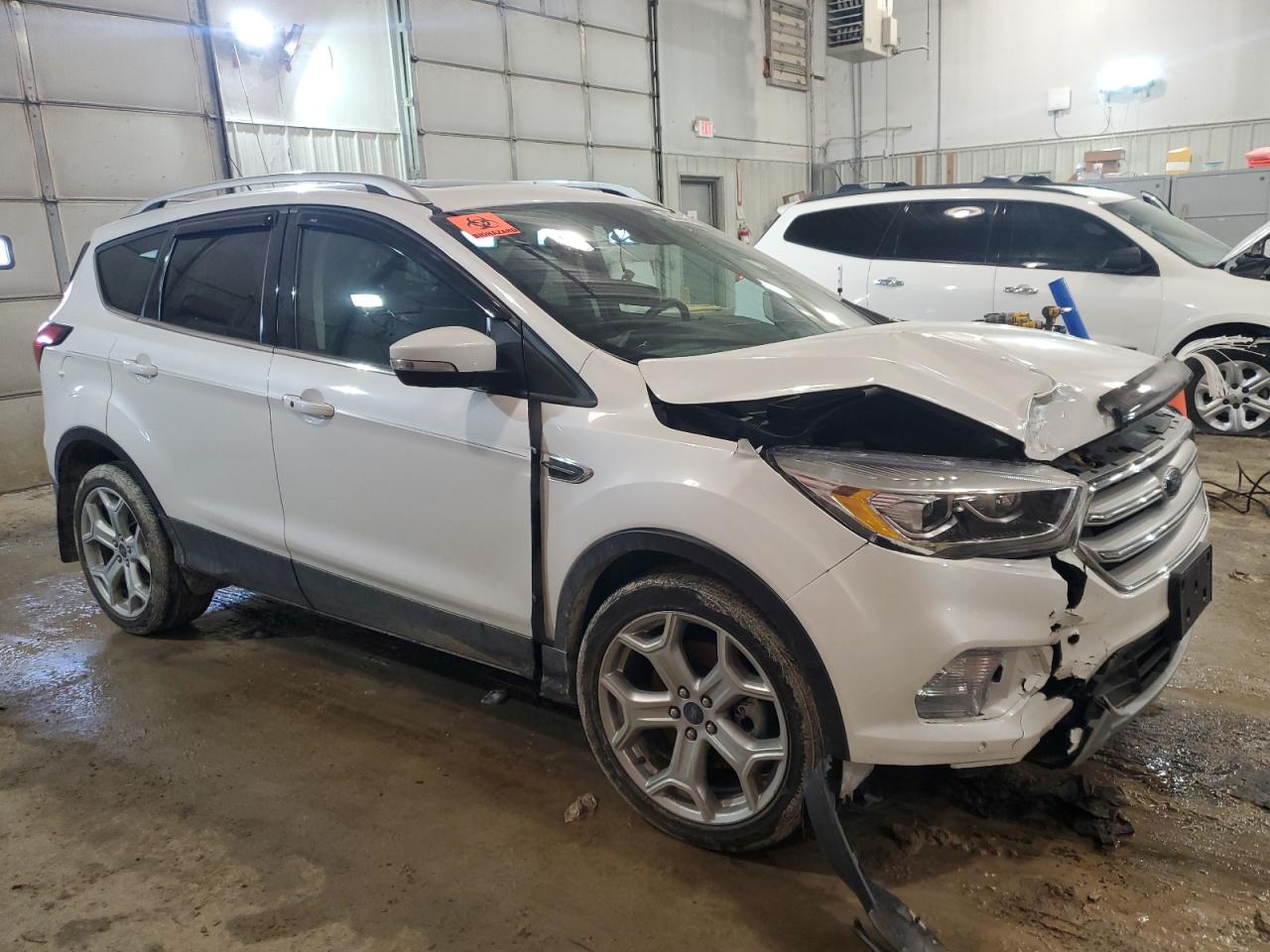 2019 Ford Escape Titanium VIN: 1FMCU9J97KUC37529 Lot: 42243404