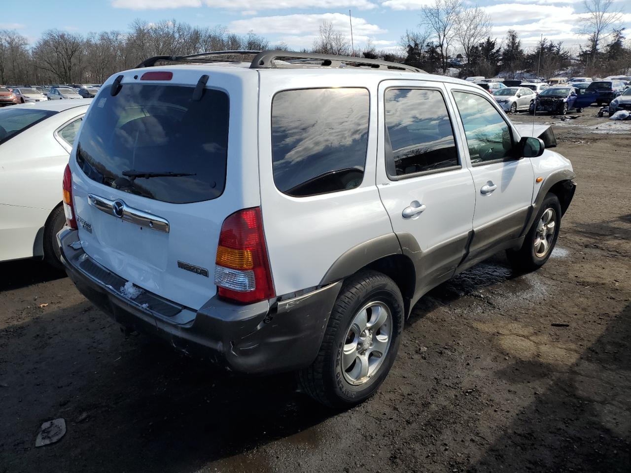 2001 Mazda Tribute Lx VIN: 4F2CU09101KM62951 Lot: 43848414