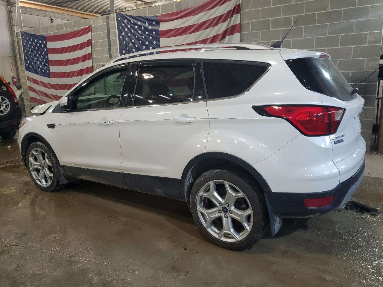 2019 Ford Escape Titanium VIN: 1FMCU9J97KUC37529 Lot: 42243404