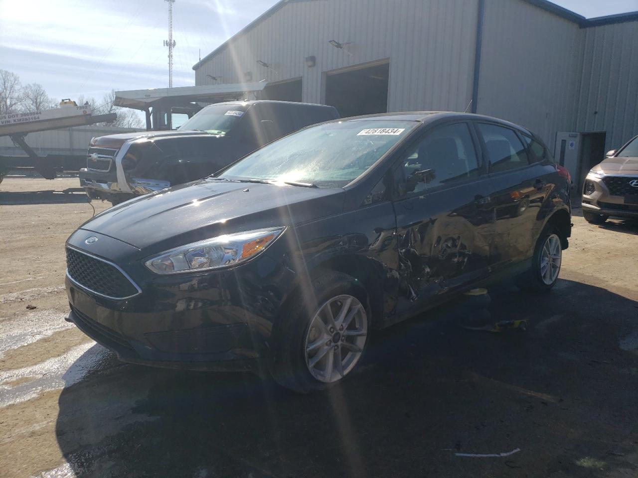 2018 Ford Focus Se VIN: 1FADP3K2XJL312300 Lot: 42818434