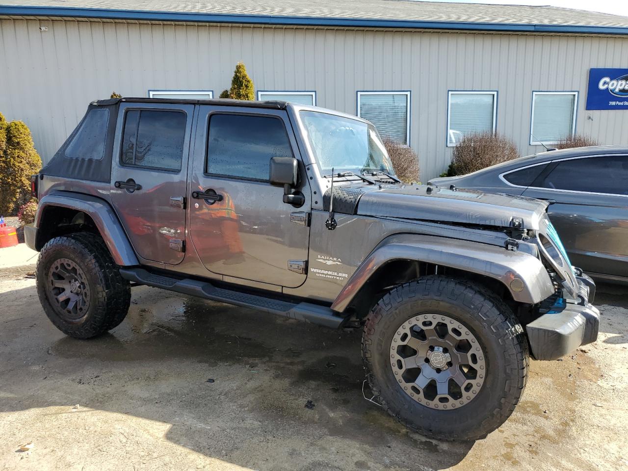 1C4BJWEG5EL210727 2014 Jeep Wrangler Unlimited Sahara