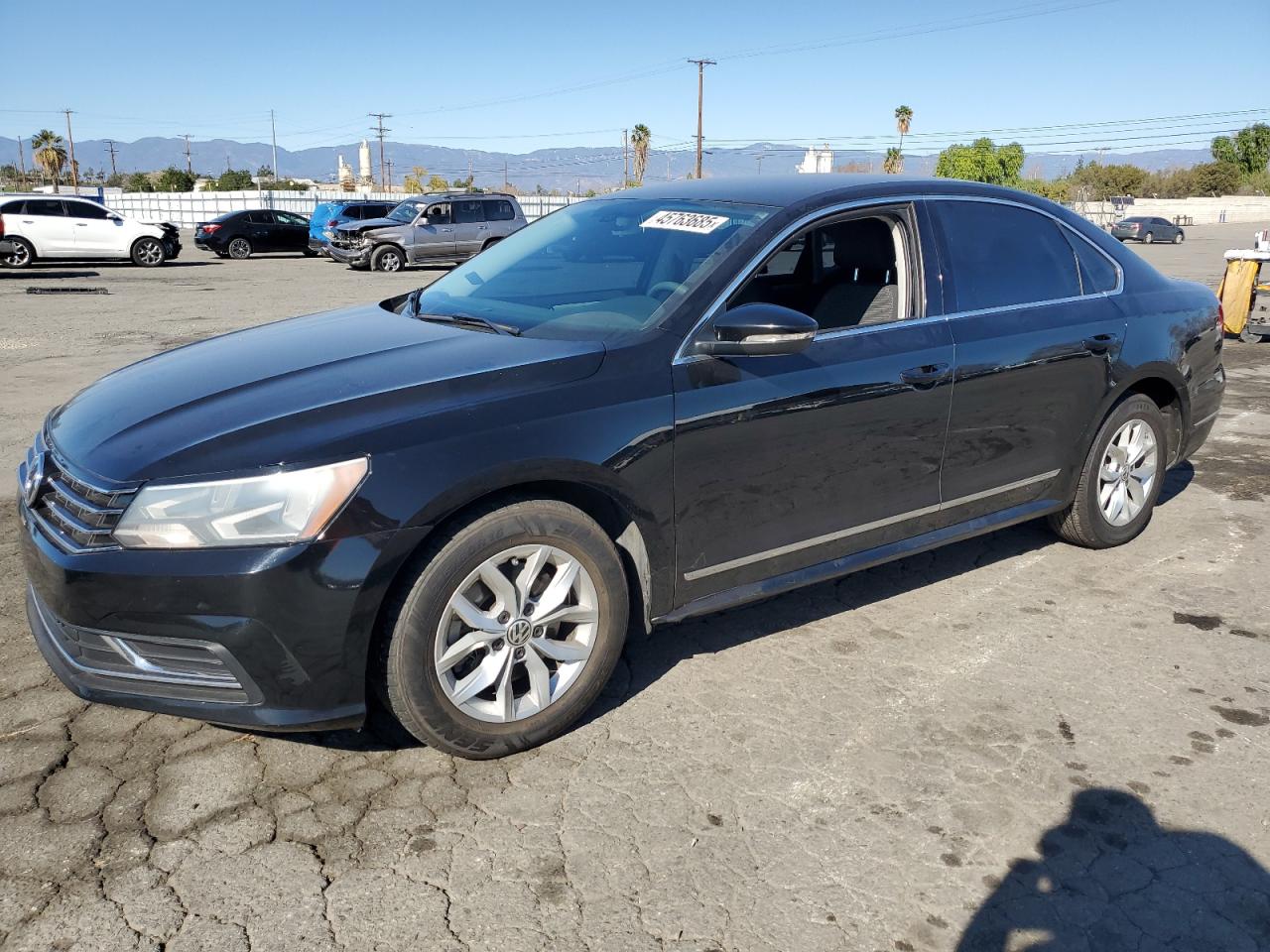 2016 Volkswagen Passat - Image 1