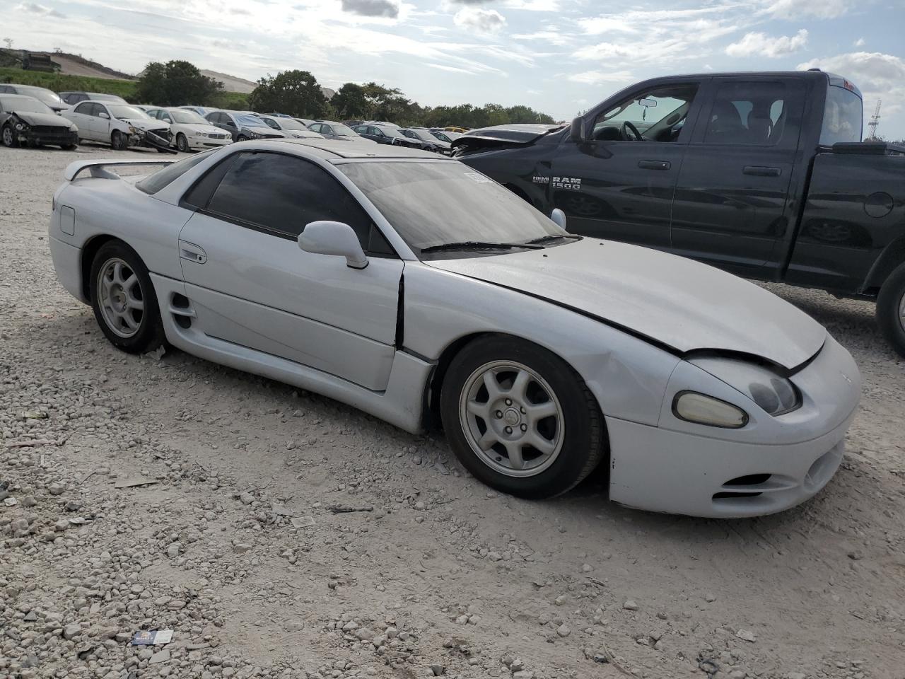 VIN: JA3AM64J4RY004161 Auction: COPART Lot: 45788125 Location: FL - WEST PALM BEACH VIN: JA3AM64J4RY004161 MITSUBISHI 3000GT 1994 SILVER Photo 4