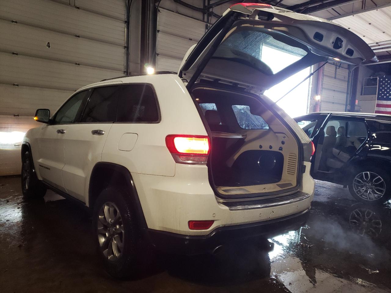 2014 Jeep Grand Cherokee - Image 2
