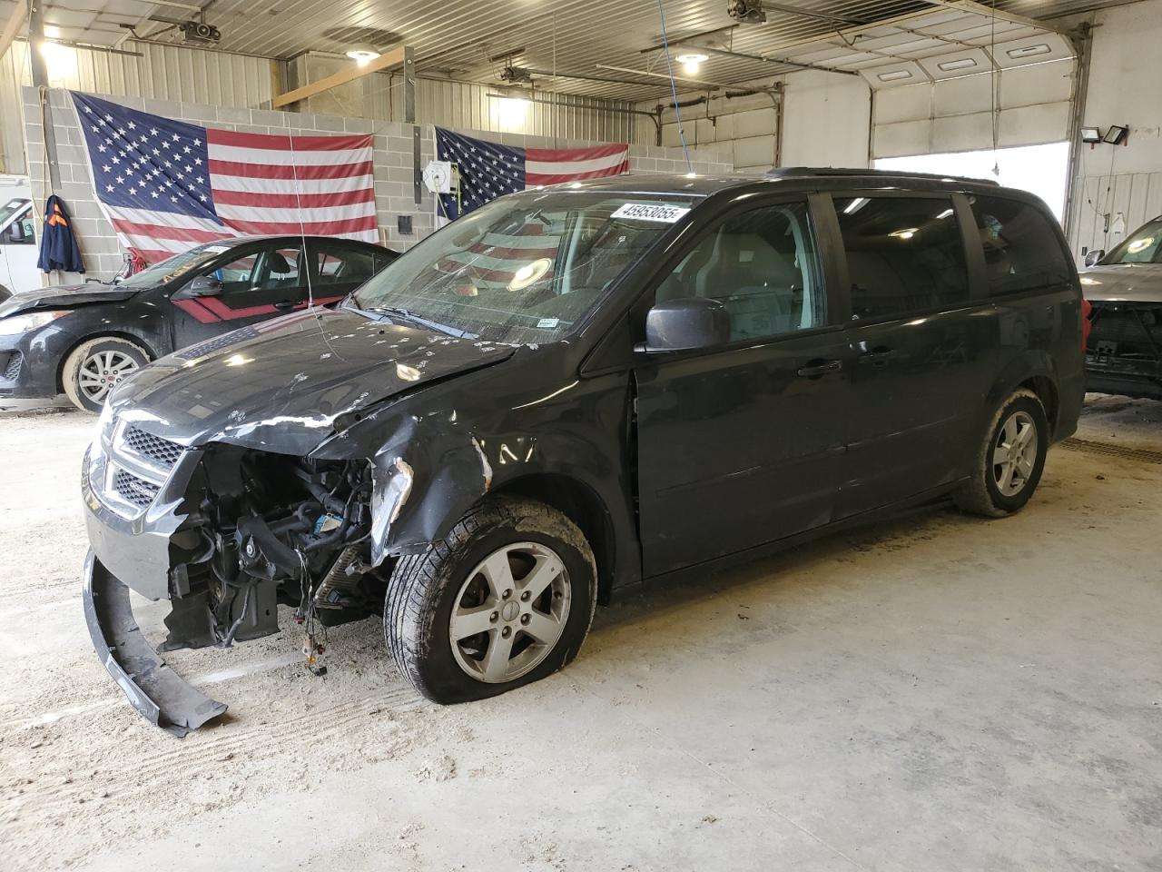 2012 Dodge Caravan - Image 1