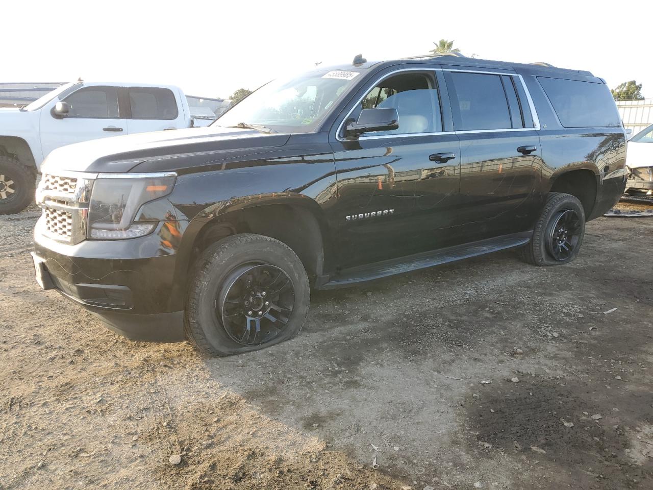 2015 Chevrolet Suburban - Image 1
