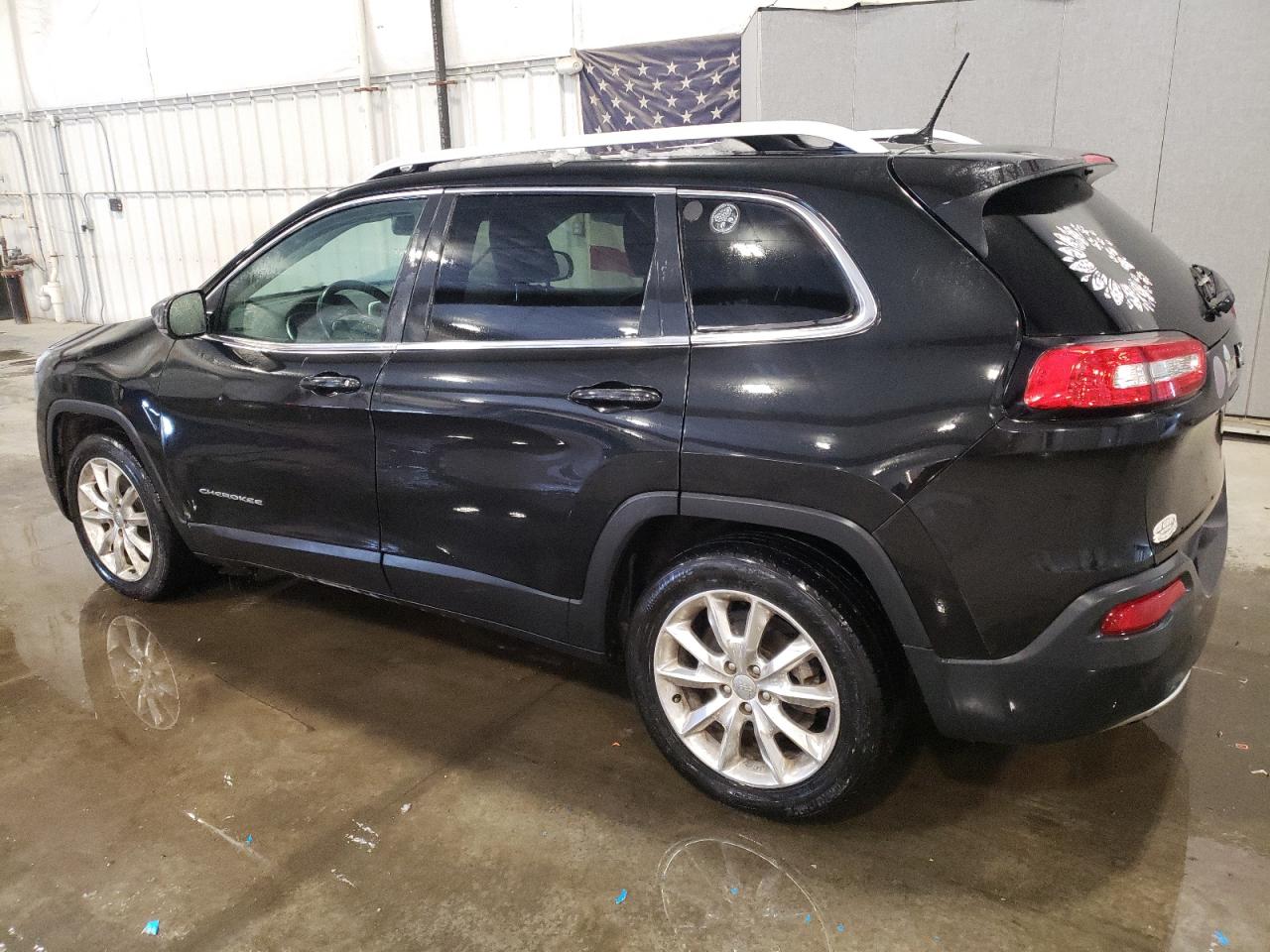 2014 Jeep Grand Cherokee - Image 2