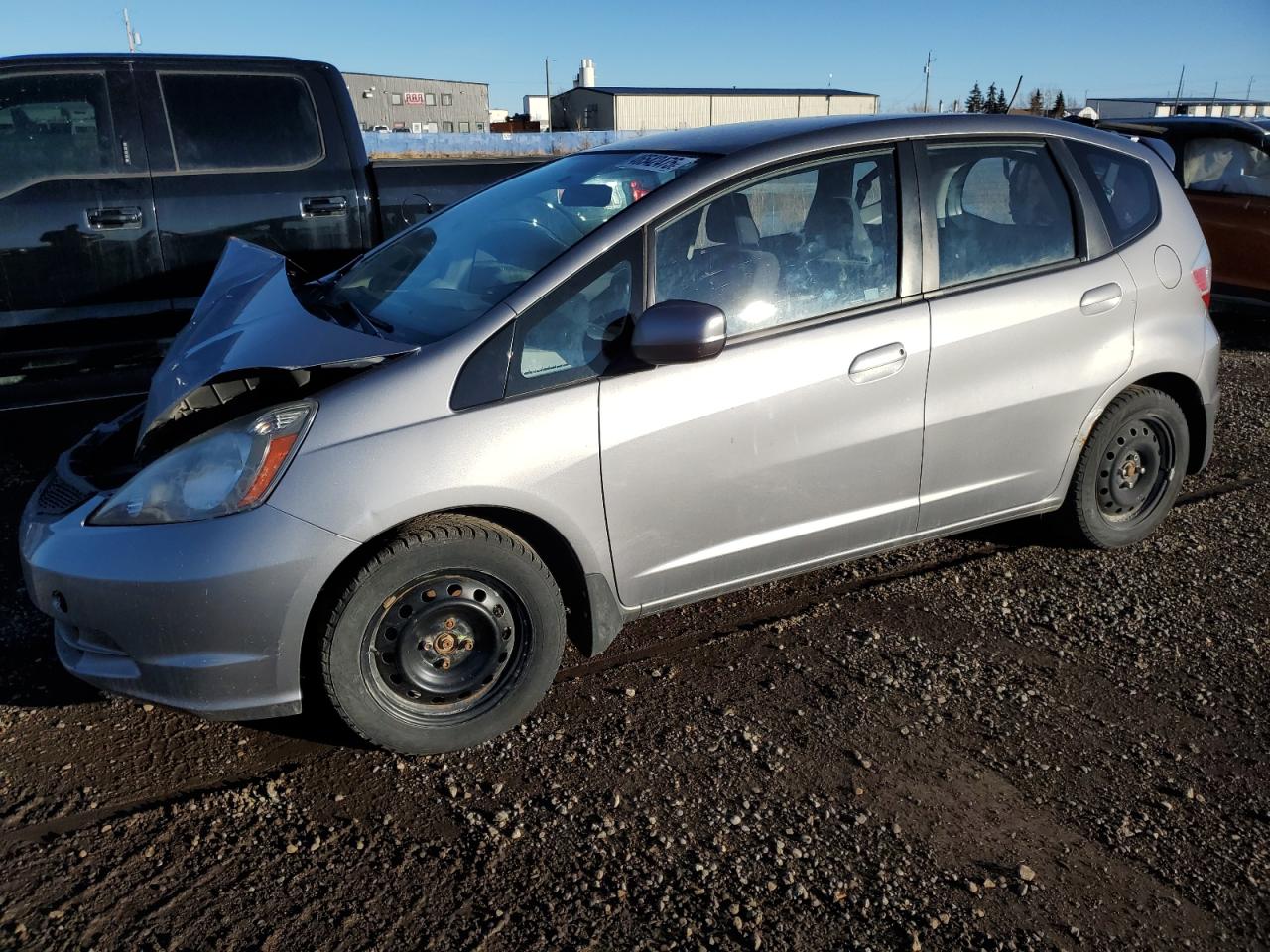 2009 Honda Fit Lx للبيع في Rocky View County، AB - Front End