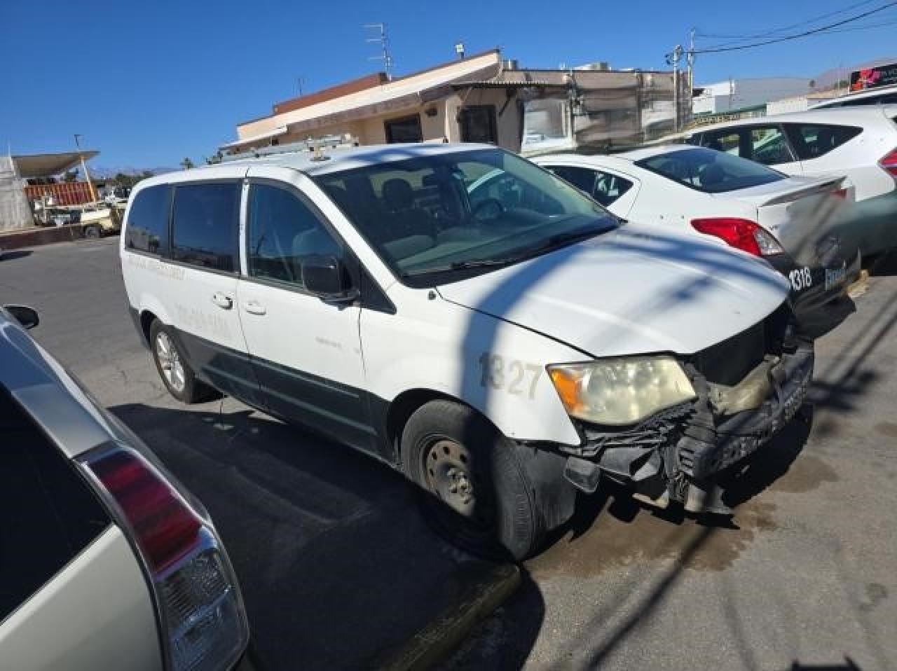 2014 Dodge Caravan - Image 1