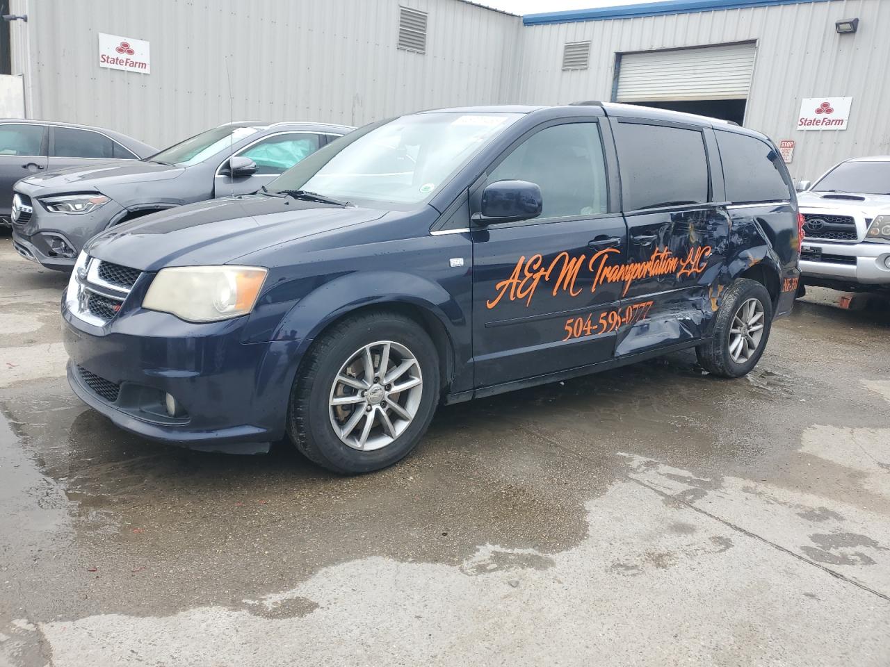 2014 Dodge Caravan - Image 1