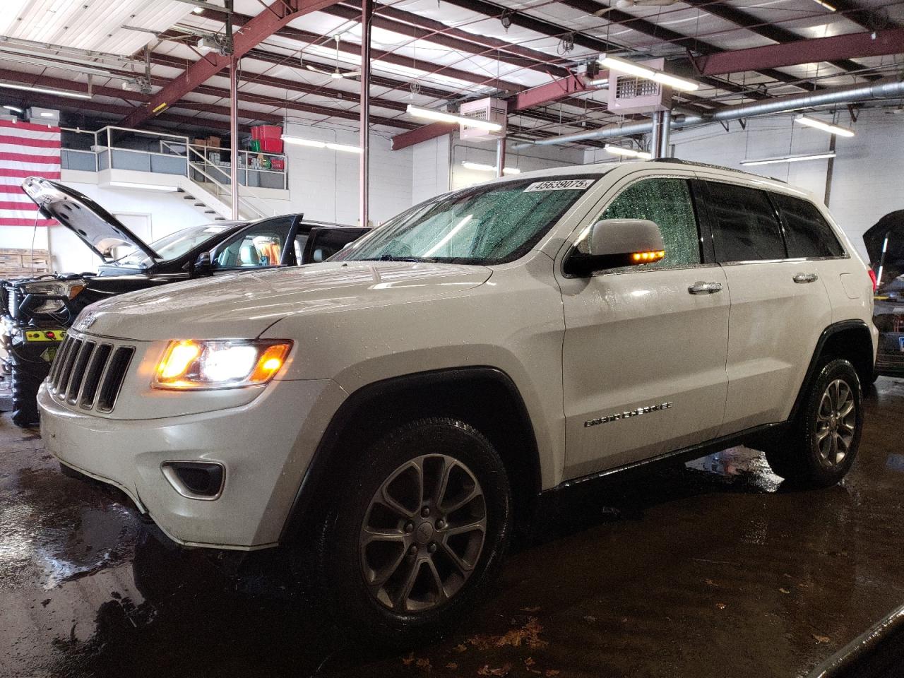 2014 Jeep Grand Cherokee - Image 1