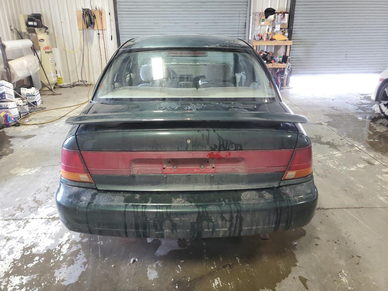 1997 Saturn Sl2 VIN: 1G8ZJ5273VZ107990 Lot: 44818295