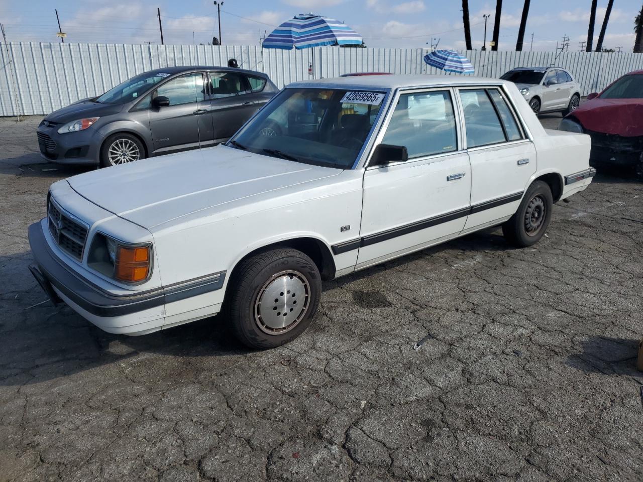 1B3BD46D3JF175079 DODGE ARIES Photo 1