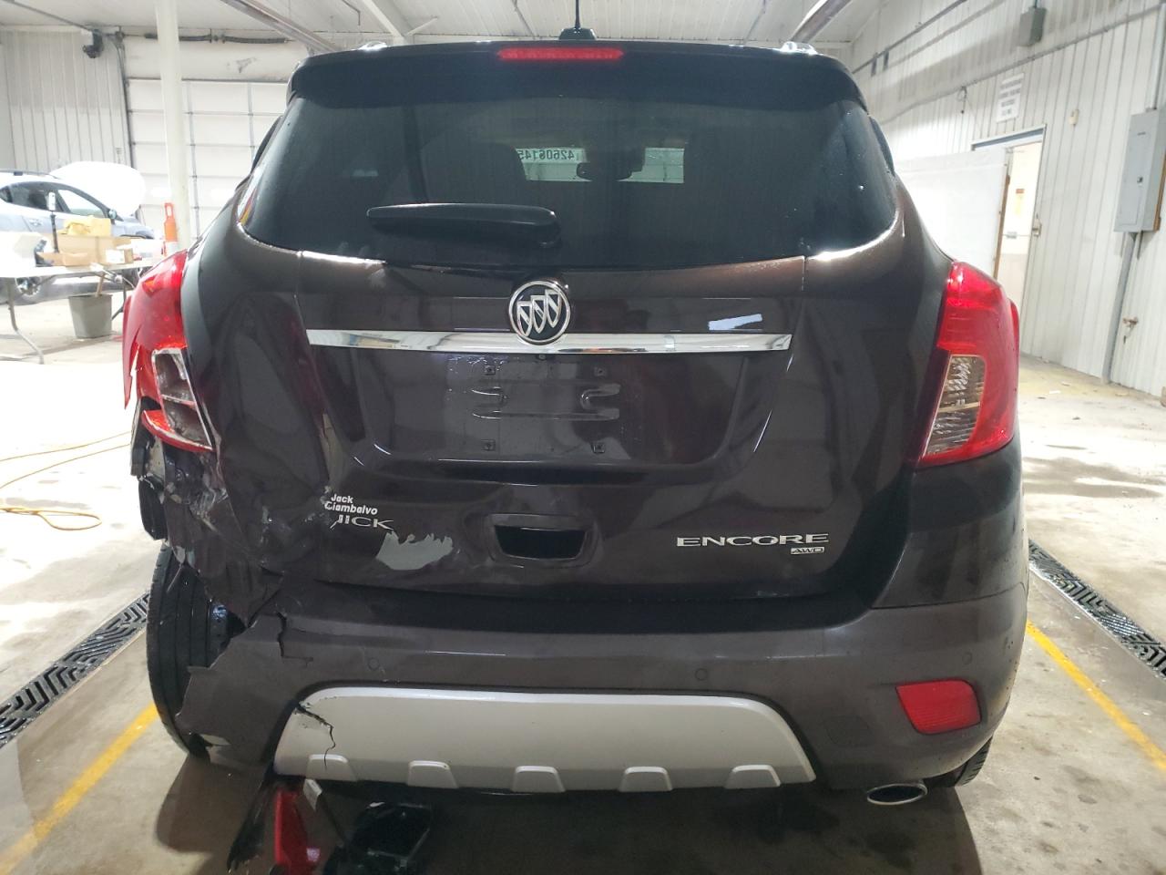 2015 BUICK ENCORE with REAR END damage, VIN KL4CJHSB6FB198095