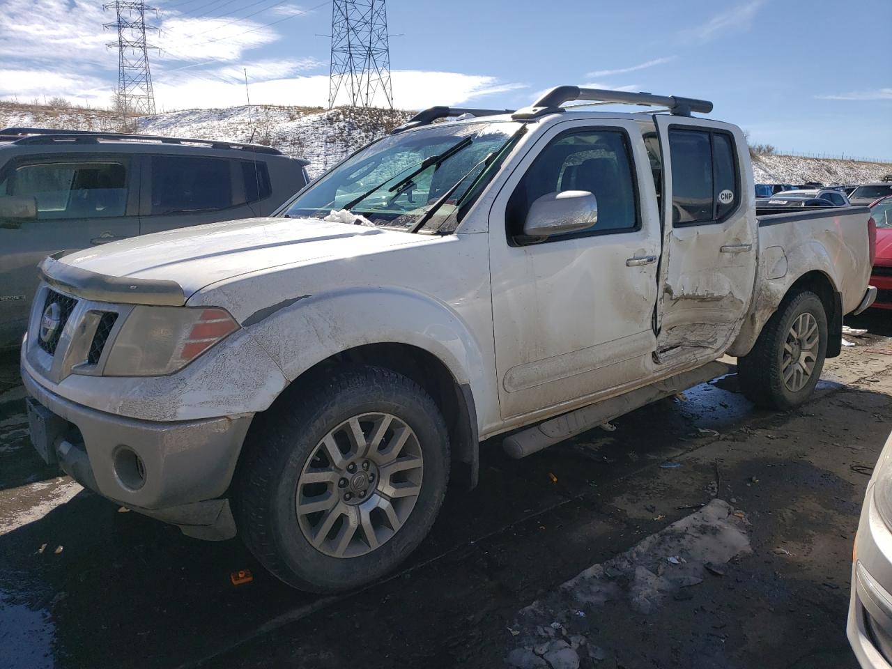 2010 Nissan Frontier Crew Cab Se for Sale in Littleton, CO - Side