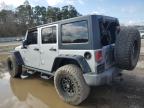 2012 Jeep Wrangler Unlimited Sport en Venta en Greenwell Springs, LA - Burn