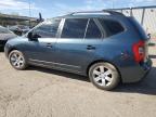 2009 Kia Rondo Base na sprzedaż w Las Vegas, NV - Side