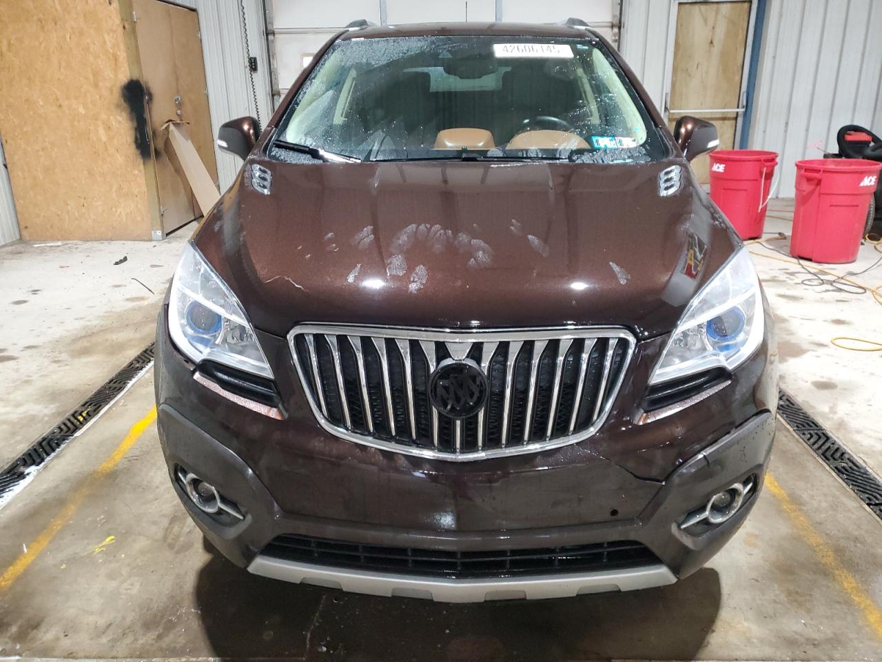 2015 BUICK ENCORE with REAR END damage, VIN KL4CJHSB6FB198095