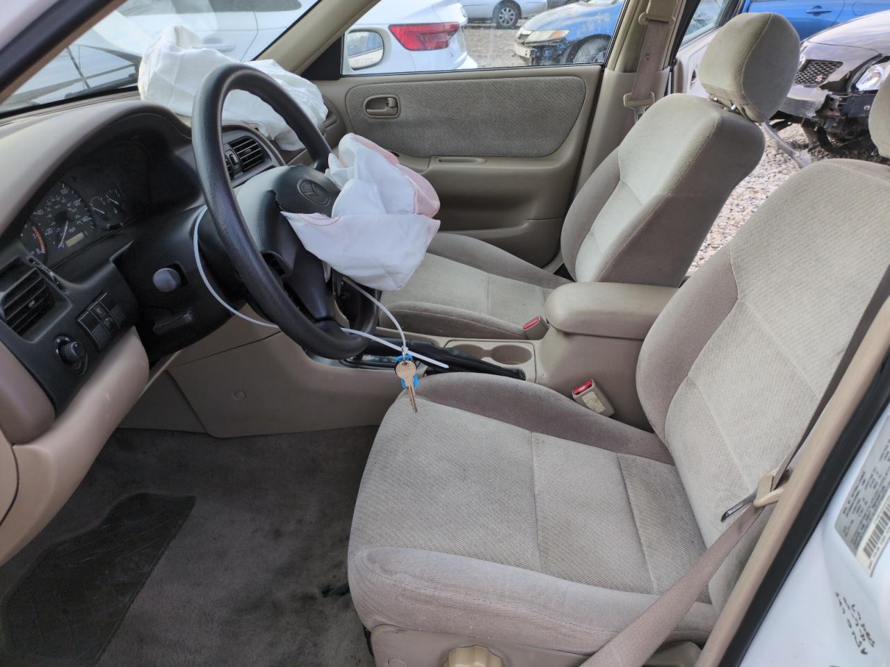 1999 Mazda 626 Es VIN: 1YVGF22C9X5887587 Lot: 46346305