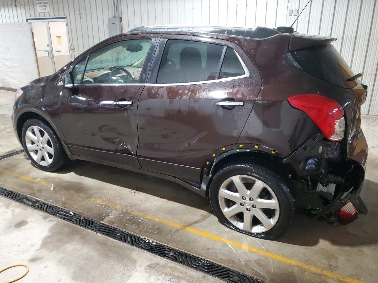 2015 BUICK ENCORE with REAR END damage, VIN KL4CJHSB6FB198095