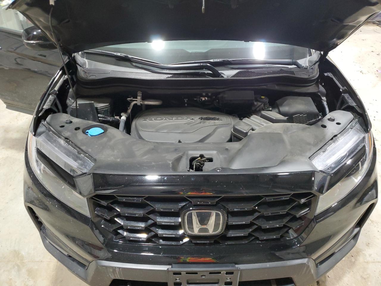 2022 Honda Passport Elite VIN: 5FNYF8H06NB030410 Lot: 47315405