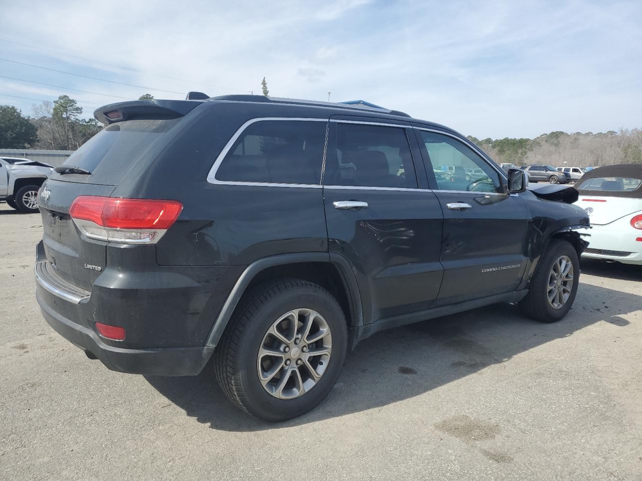 2014 Jeep Grand Cherokee - Image 3